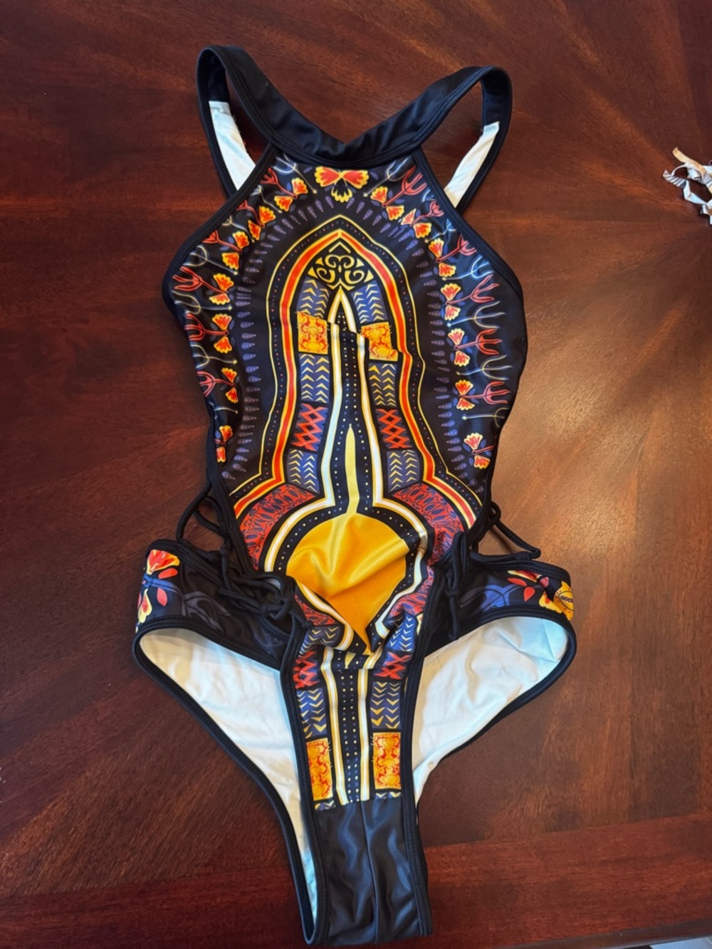 One-Piece Bfyne Swimsuit with Sexy Cutouts and Bold Multicolor Tribal Print